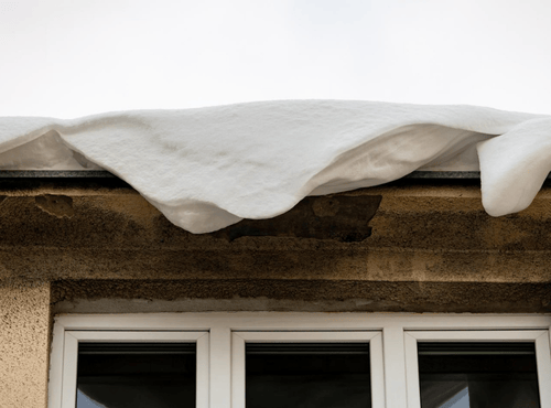 Roof Sagging During Winter Snow Accumulation